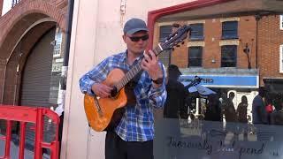 Does any one know the name of this person. Street Entertainers in Stratford Upon Avon (A6)