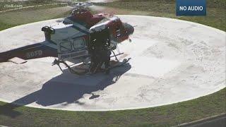 Fire department helicopter lands at hospital after cliff rescue