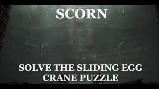 Scorn: How to Solve the Crane Sliding Egg Puzzle