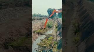 Excavator Mastery Precision Dredging in Narrow Canal