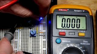 Multimeter Voltage Measurements Of 555 Timer Schmitt Trigger Inverter Circuit