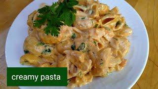 creamy macaroni pasta with pink sauce/Arabic style 