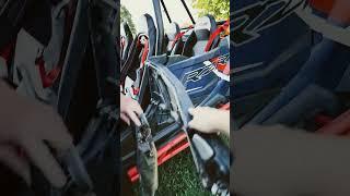 taking off lower doors on RZR Premium with speakers.... whhyyy do they make it so hard