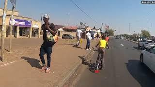 Bike riding in Soweto into Old Potch Road, Bara road