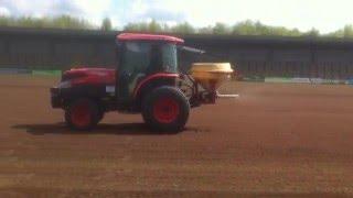 Sports Pitch Maintenance - Spreading fertiliser