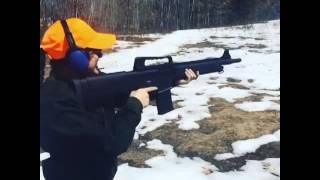 Girl Shooting the BR-99 Shotgun