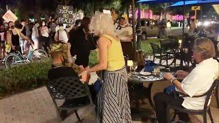 Couple Dining Outside Is Confronted by Protesters