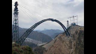 Lower ends of arch of world''s highest railway bridge in Reasi connected