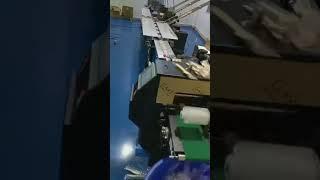 kitchenware packing machine with automated feeder system