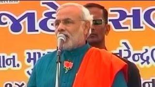 Narendra Modi dares Congress in Gujarat, targets Sonia aide Ahmed Patel