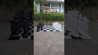 Human size chess board outdoors in #arusha #granmeliahotel #chess #chessboard #outdoors #waterfall