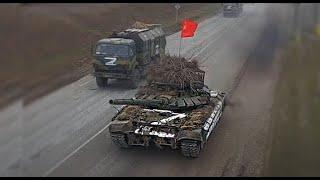 WATCH: Russian Tanks flying Soviet Flags in Ukraine