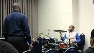 13 yrs old POOTER! Killing on drums at COGIC AIM 2012