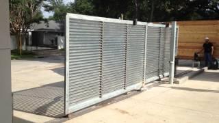 Tandem louvered automatic slide gate