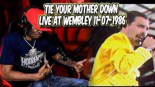 HoodFacts TV Reacts to Tie Your Mother Down Live at Wembley 11-07-1986