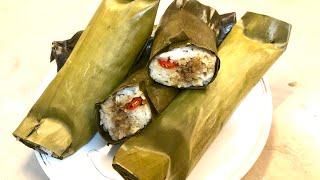 Minced meat rice cake wrapped with banana leaves ( arem arem ) 