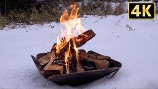 Relax with the sound of snow and a bonfire for 1 hour and 43 minutes