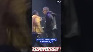 Awkward moment Diddy butt slaps Jay-Z 