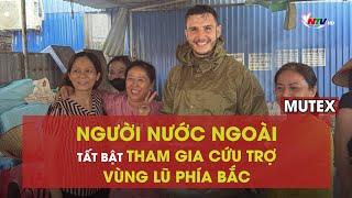 Người nước ngoài tất bật tham gia cứu trợ vùng lũ phía Bắc