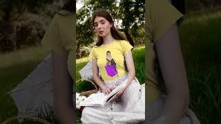 Video of sexy young women modeling t-shirt designs by Michael Rosskothen