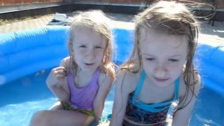 Girls play in the kiddie pool