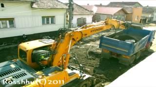 Hyundai Robex 140 W-9 working @my street