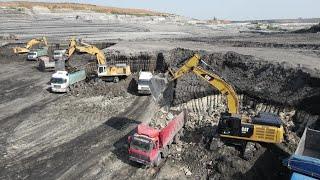 Four Liebherr & Caterpillar 974, 964 And 352F Working On A Huge Mine - Aerial View - Ascon Ltd