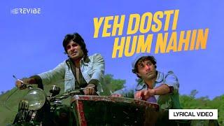 Yeh Dosti Hum Nahin (Lyrical Video) | Kishore Kumar, Manna Dey | Dharmendra, Hema Malini