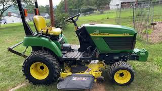 The John Deere 2210 Mowing