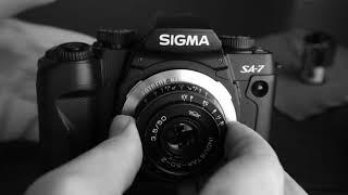 Sigma SA 7 Film Camera Sigma 28-80mm zoom lens + industar 50-2 adapted lens