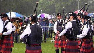 Coalburn IOR Pipe Band competing in downpour at Forres for 2024 British Pipe Band Championships