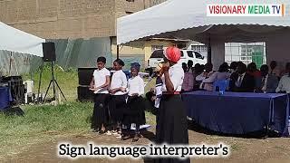 Children perform Msanii Music Group song using sign language.