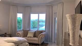 MOTORIZED CURTAINS & MOTORIZED ROLLER BLINDS ABU DHABI