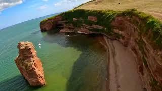 Red rocks in Devon️ Ladram Bay by fpv drone Diatone Roma f5