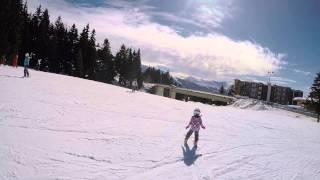 Five years old Luizka skiing in France. February 2015.