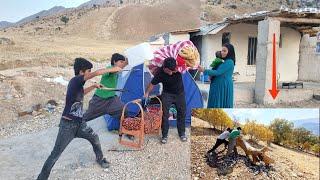 Collecting wood to escape the winter cold by Omid and his mother