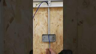 Wiring an electrical socket through steel conduit
