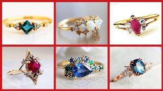 latest delicate light weight Gold rings designs engagement ring designs with colourful gemstone