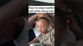 How to keep toddler still while doing hair