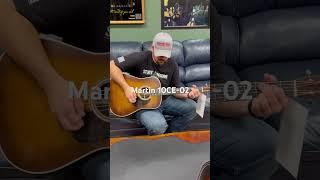 Tyler playing a nice Martin guitar at Bailey Brothers Music in Birmingham