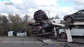 14.04.2021 - VN24 - Car transporter with brand new BMW cars crashes into traffic jam on A44 motorway