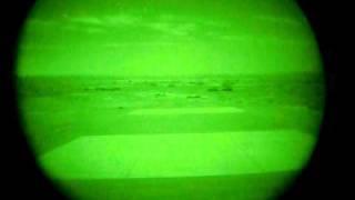 AC130 firing 105mm Howitzer through NVG