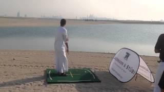 UAE Golf Pro Ahmed Al Musharrekh hitting some balls on the World Islands in Dubai