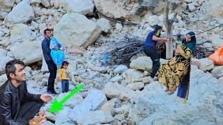 Chavil family crossing the river and Ali's hands were wounded