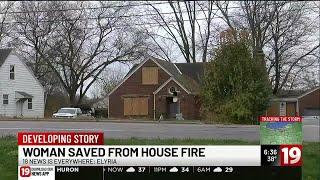 Woman in critical condition after Elyria Township house fire