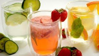 Refreshing summer drinks - strawberry lemonade, detox water, orange infusion