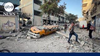 Palestinians flood aid distribution center as new aid operation starts in Gaza