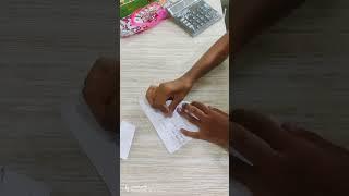 littlegirl making paper Bowl with out cutting