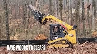 CAT 259 with Bush Hog