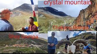 lama is explaining about crystal mountain, Chakang Gompa and Shey Gompa